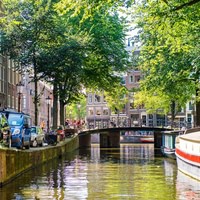 Cruise like a local in an open boat in Amsterdam