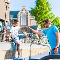 Cruise like a local in an open boat in Amsterdam