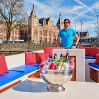 Cruise like a local in an open boat in Amsterdam