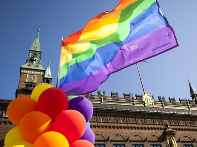 Pride flag and balloons in Copenhagen 1000x750