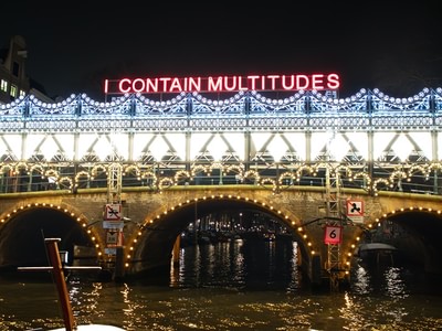 Amsterdam light festival we contain multitudes boat bridge art for seo text