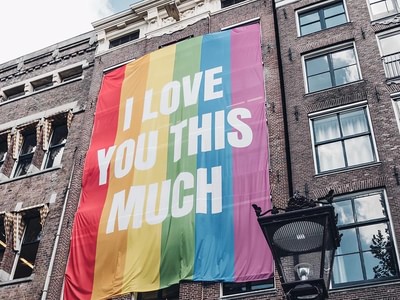 Amsterdam pride rainbow flag on a building 2mod41ob