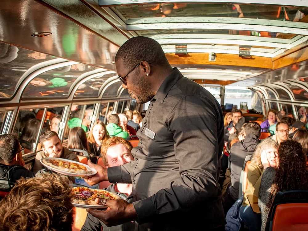 Discover Amsterdam with a delicious Pizza Cruise