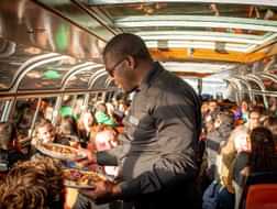 Discover Amsterdam with a delicious Pizza Cruise
