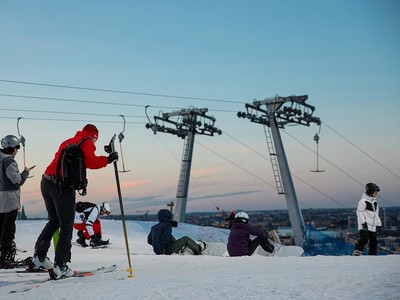 Skiing at sunset at hammarbybacken s5xbia3f